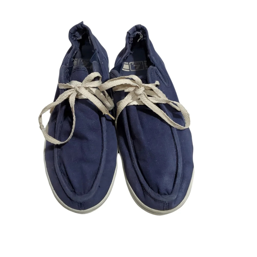 Men's blue and white Lugz sneakers.